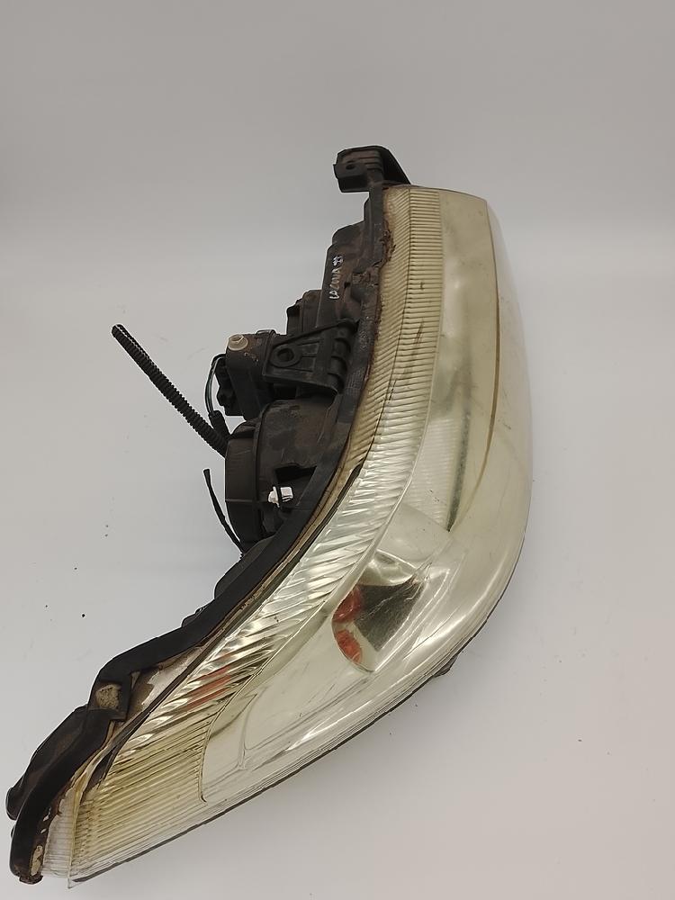 Headlamp rh 7701048931 de Renault Laguna ii grandtour (kg0/1_) 2001-2006 - pieza usada