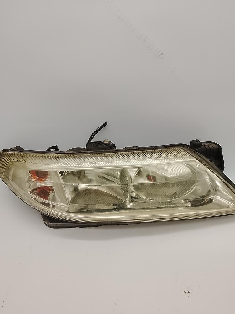 Headlamp rh 7701048931 de Renault Laguna ii grandtour (kg0/1_) 2001-2006 - pieza usada