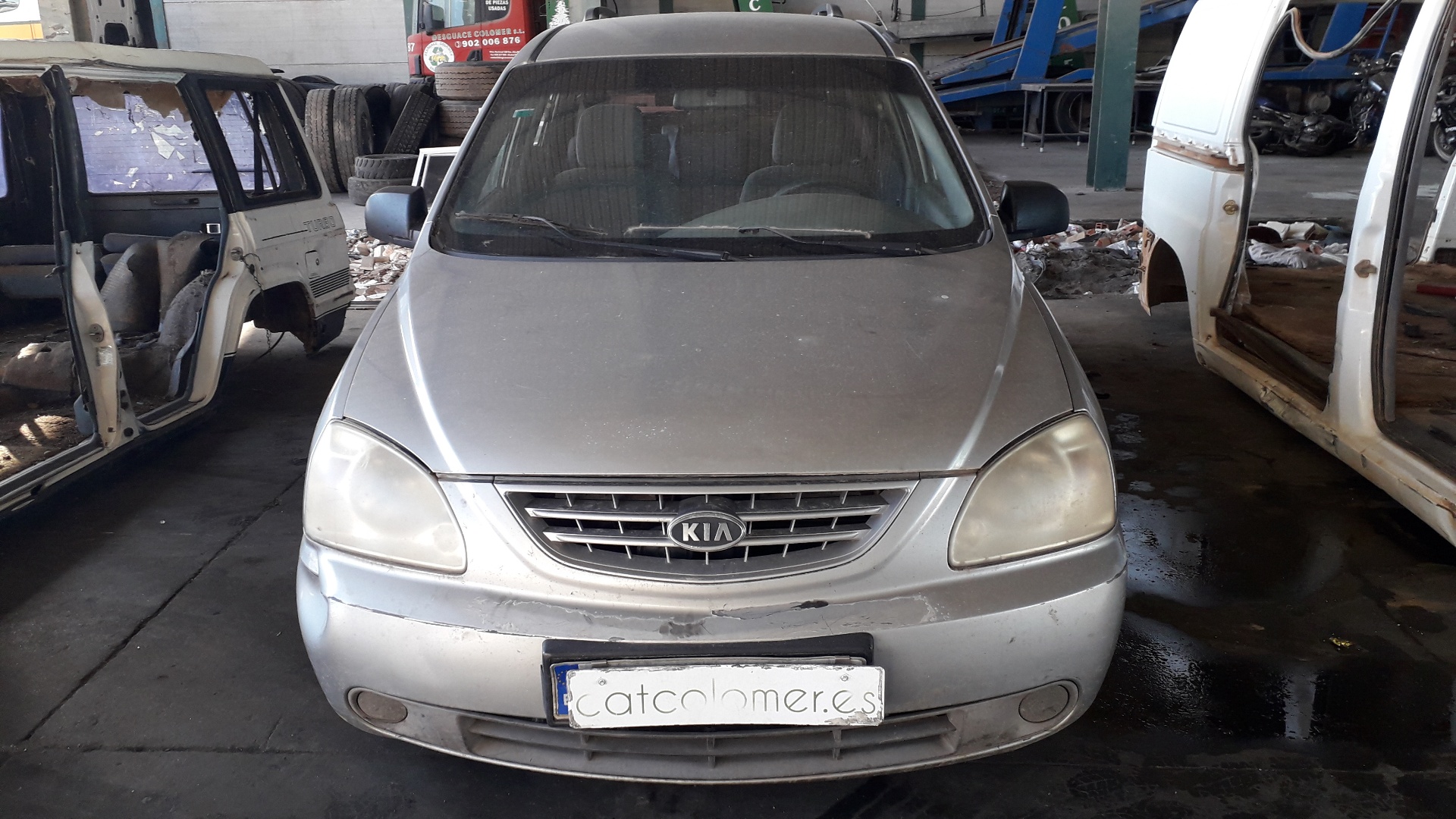 KIA Carens 2 generation (2002-2006) Полуось передний левый 23351155