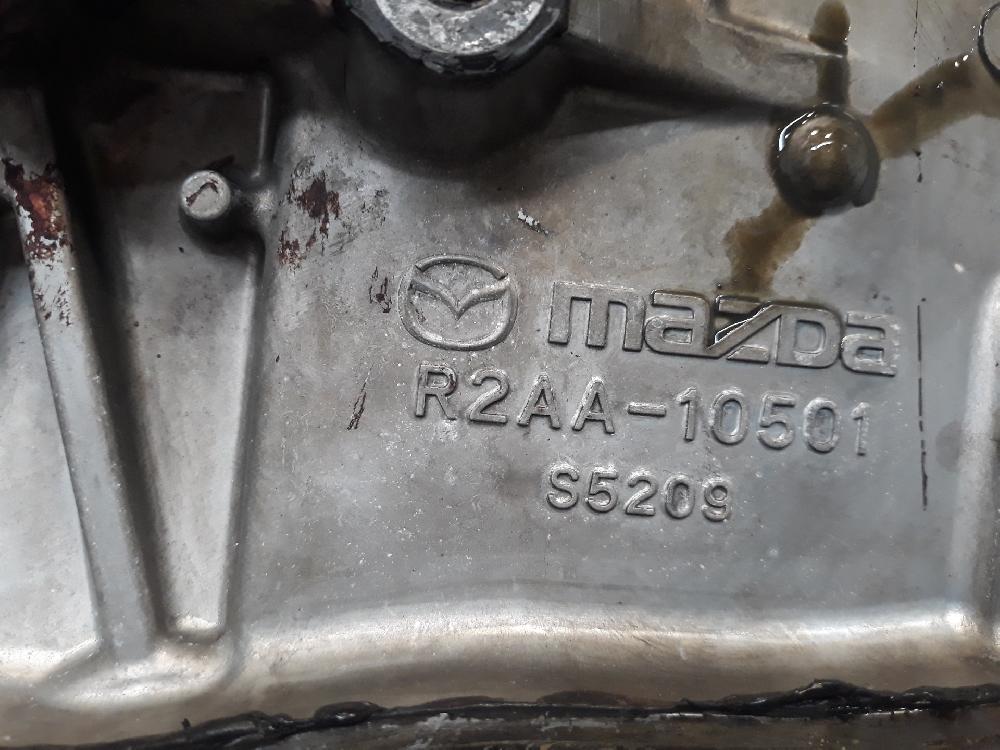 Tapa distribución R2 110 KW R2AA10501 de Mazda 3 sedán (bl) 2008-2013 150 CV con 1 km - pieza usada