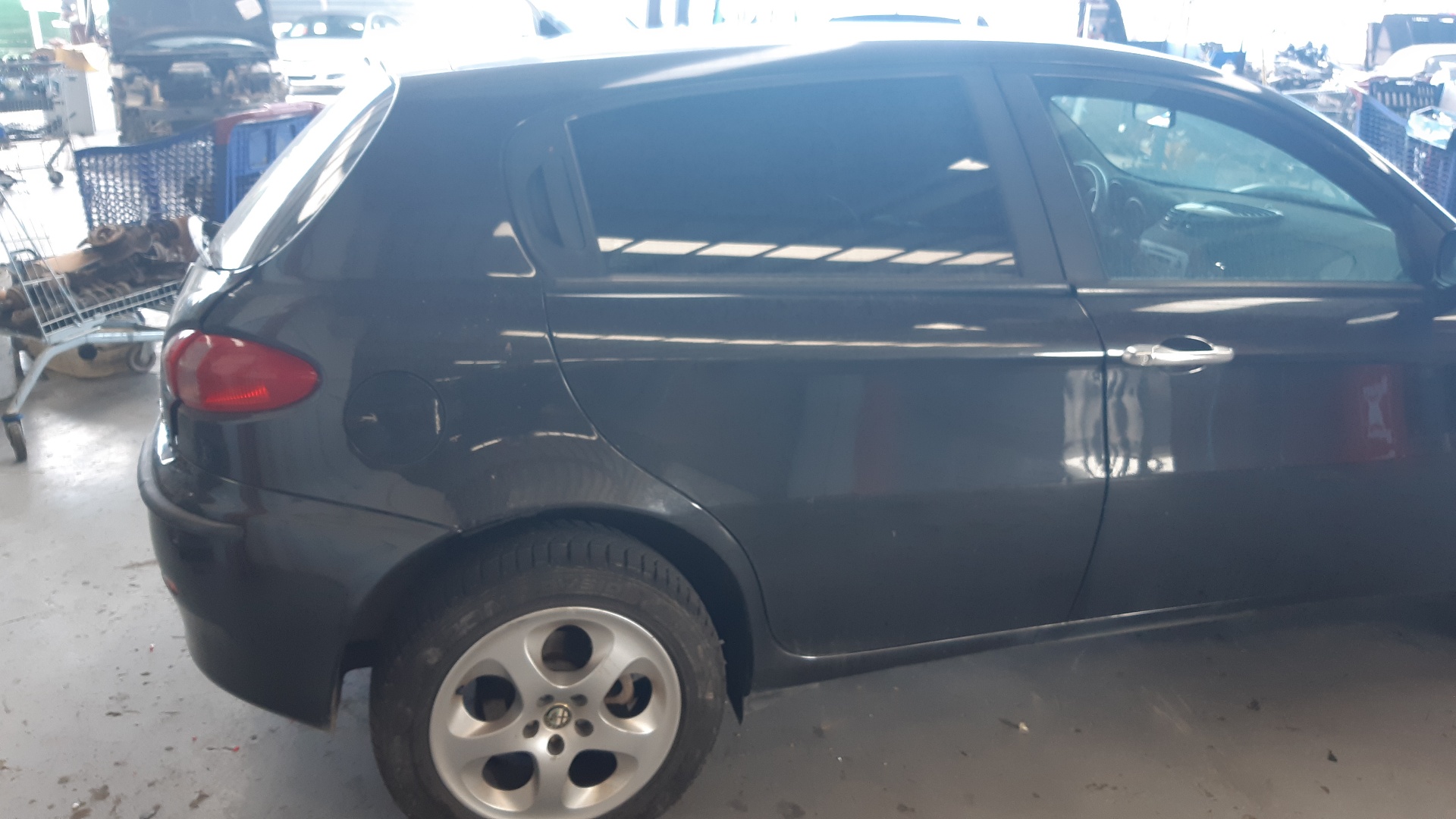 NISSAN 147 2 generation (2004-2010) Bara de protecție spate NEGRO 25035506