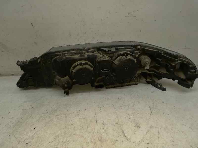 Headlamp rh F9QC750 7701048931 de Renault Laguna ii grandtour (kg0/1_) 2001-2006 120 CV - pieza usada