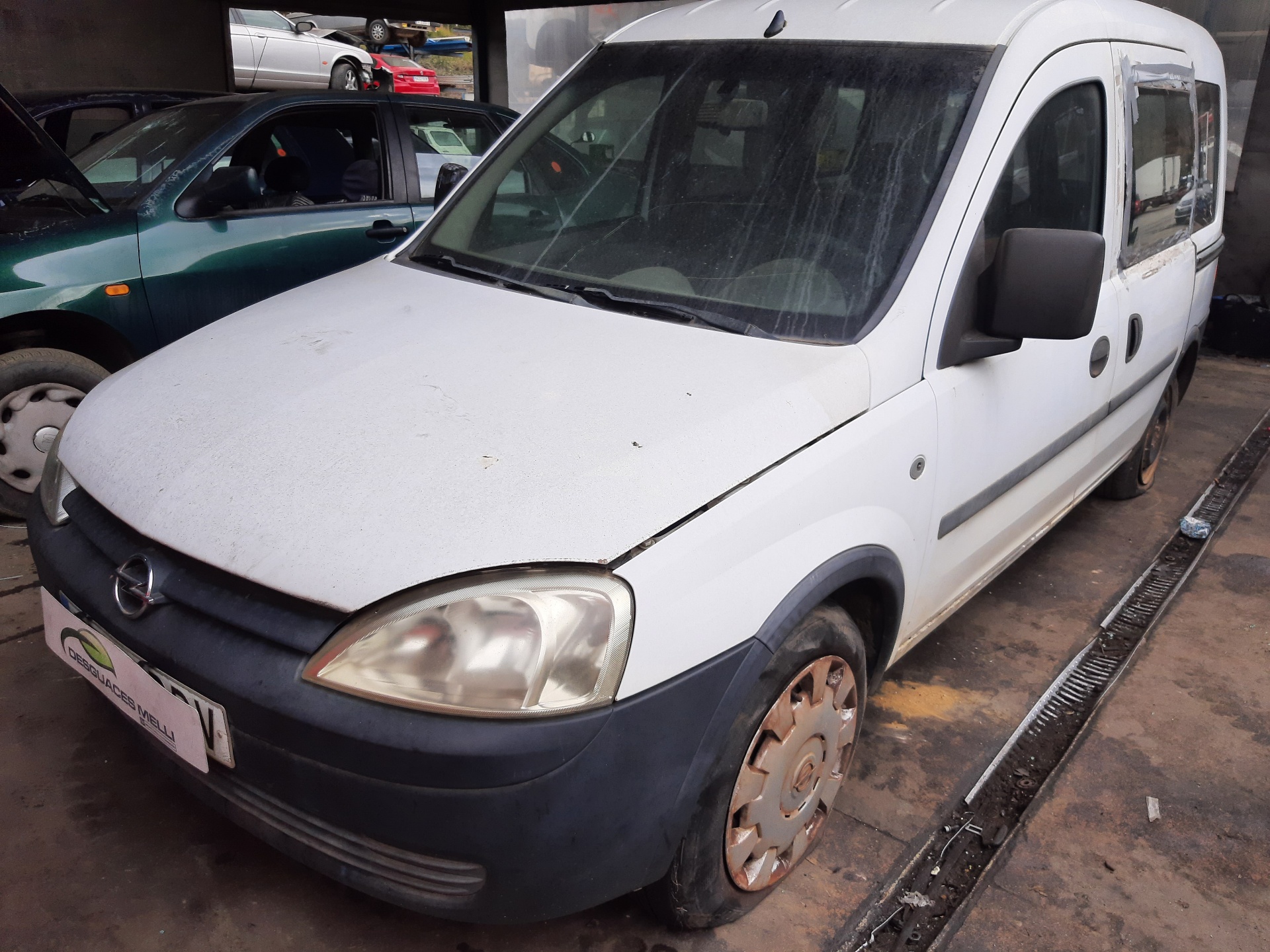 OPEL Combo C (2001-2011) Mâner exterior al ușii din stânga față 09201063 24045312