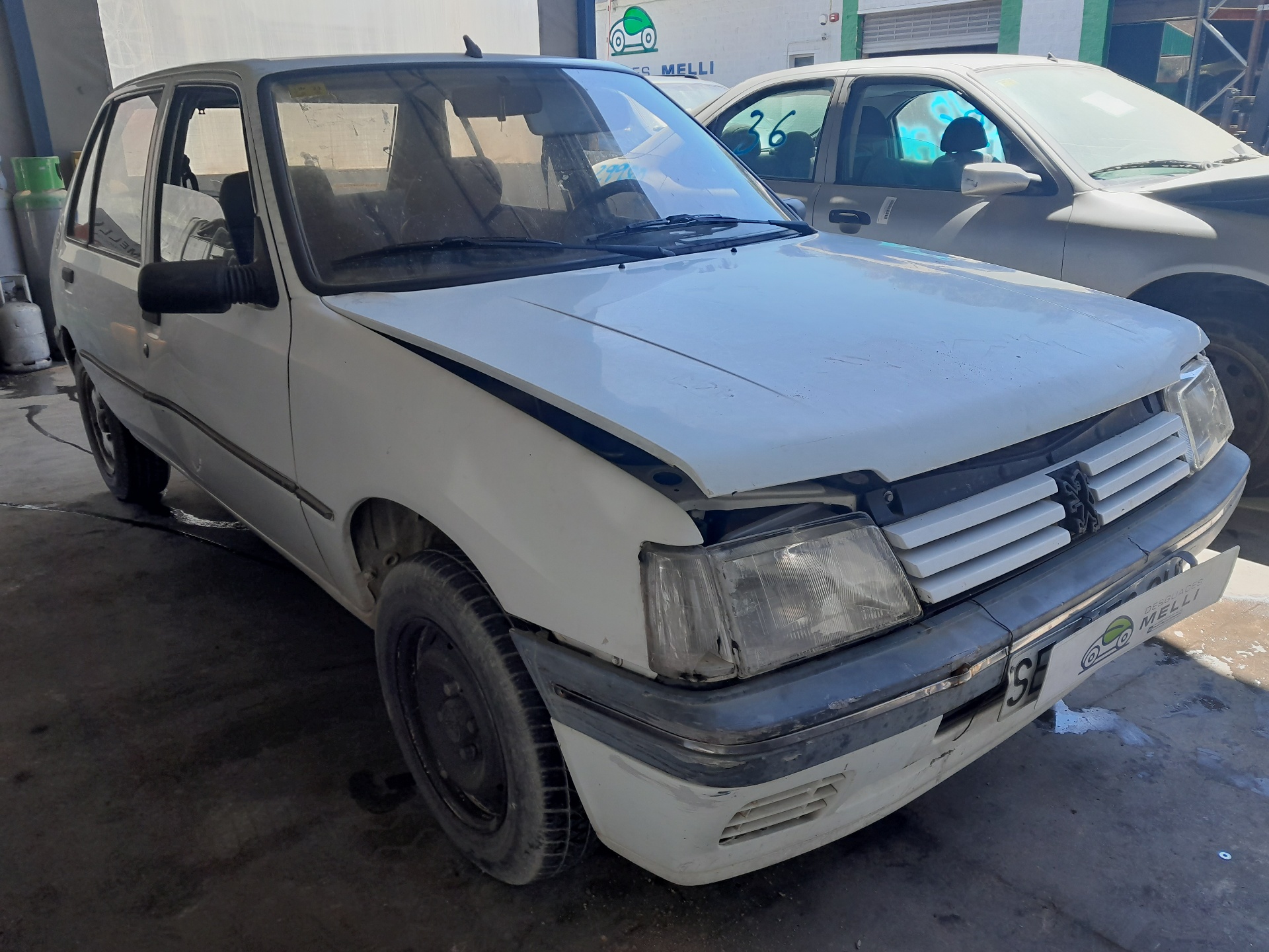 PEUGEOT 205 1 generation (1983-1998) Замок двери передний правый 9136A1 21085673