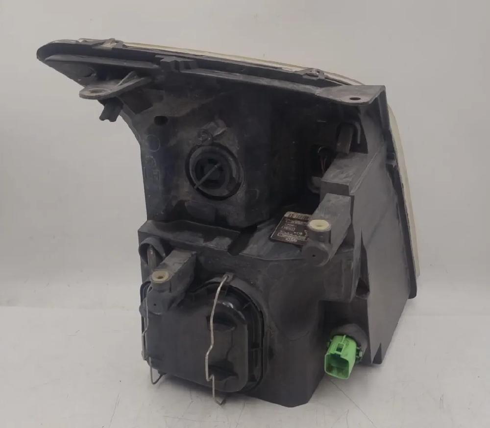 Faro anteriore sinistro SRFA 1537774 de Ford Transit caja/chasis (fm_ _, fn_ _, ff_ _) 2006-2008 con 278822 km - pieza usada