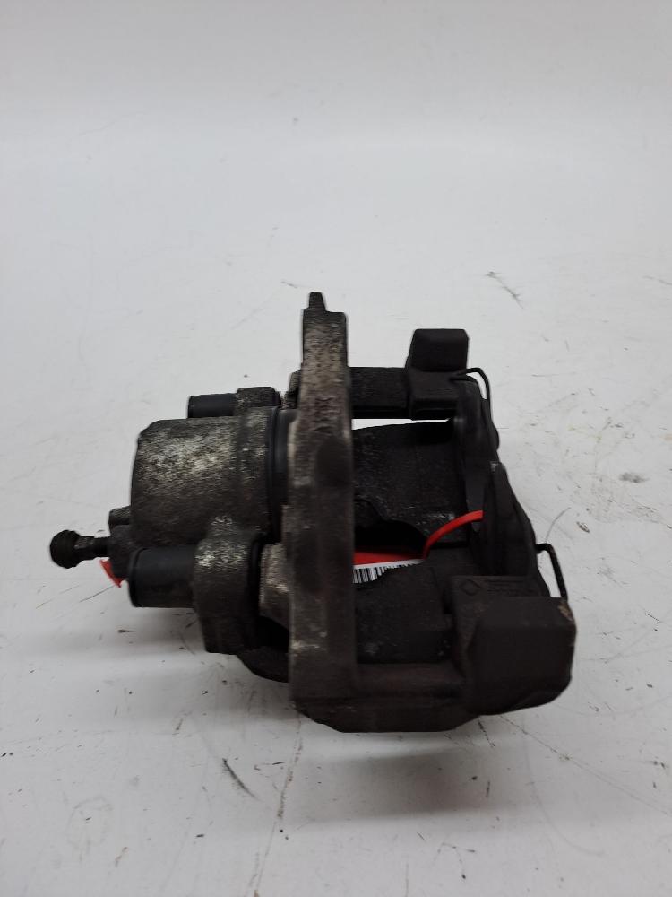 Left front brake caliper 36000484 de Volvo V40 2012-2015 - pieza usada