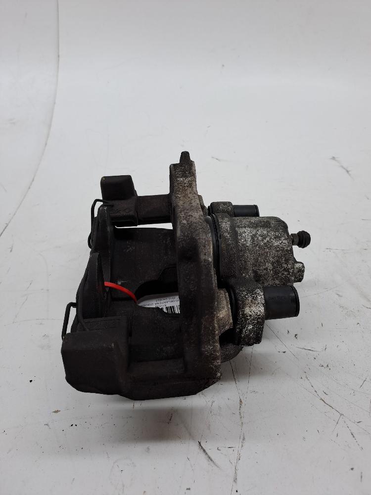 Left front brake caliper 36000484 de Volvo V40 2012-2015 - pieza usada