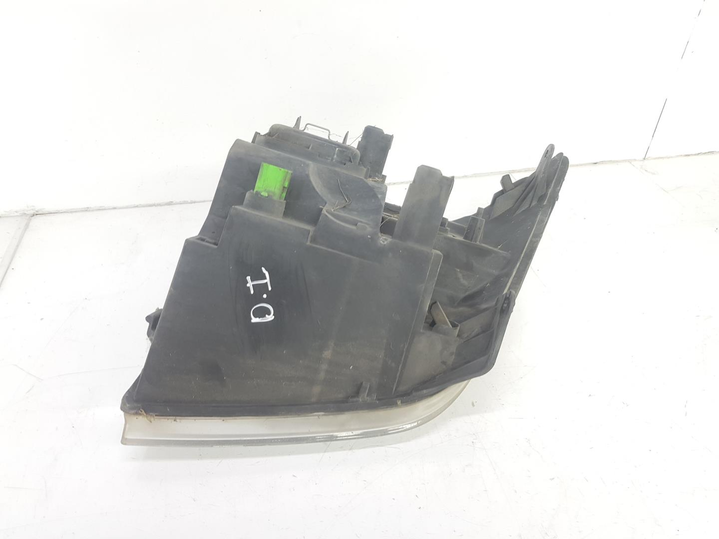 Headlamp left side SRFA 1537774 de Ford Transit caja/chasis (fm_ _, fn_ _, ff_ _) 2006-2014 116 CV con 158511 km - pieza usada