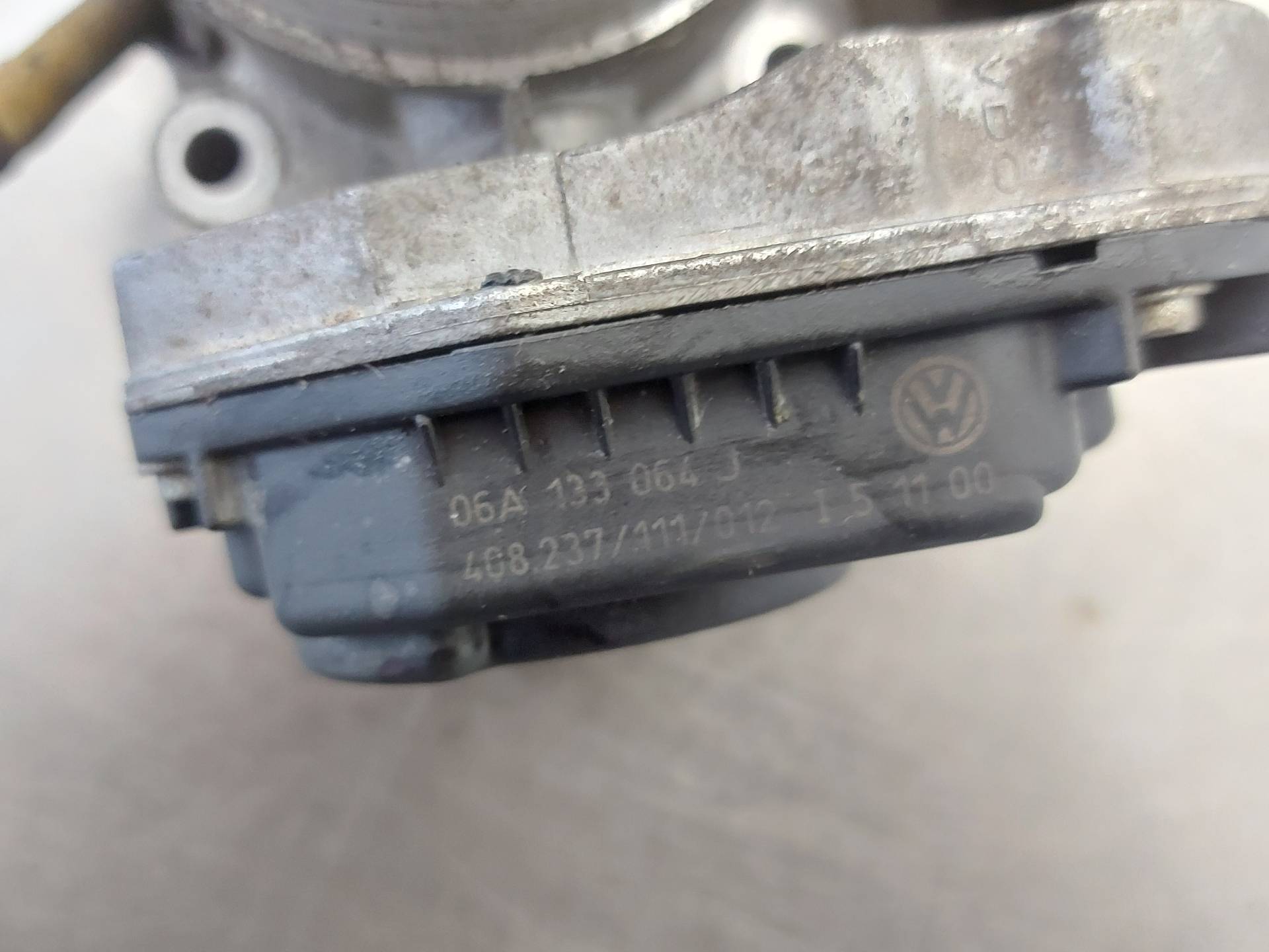 TOYOTA Carina E Дроссельная заслонка 06A133064J 26410303