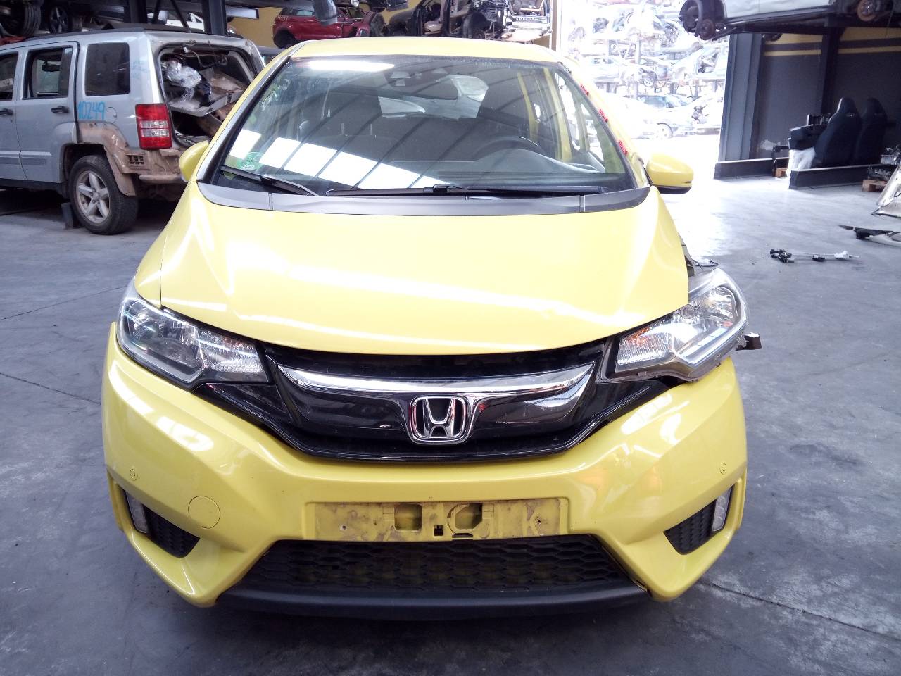 HONDA Jazz Левая противотуманка переднего бампера E3-B5-18-3 21800005