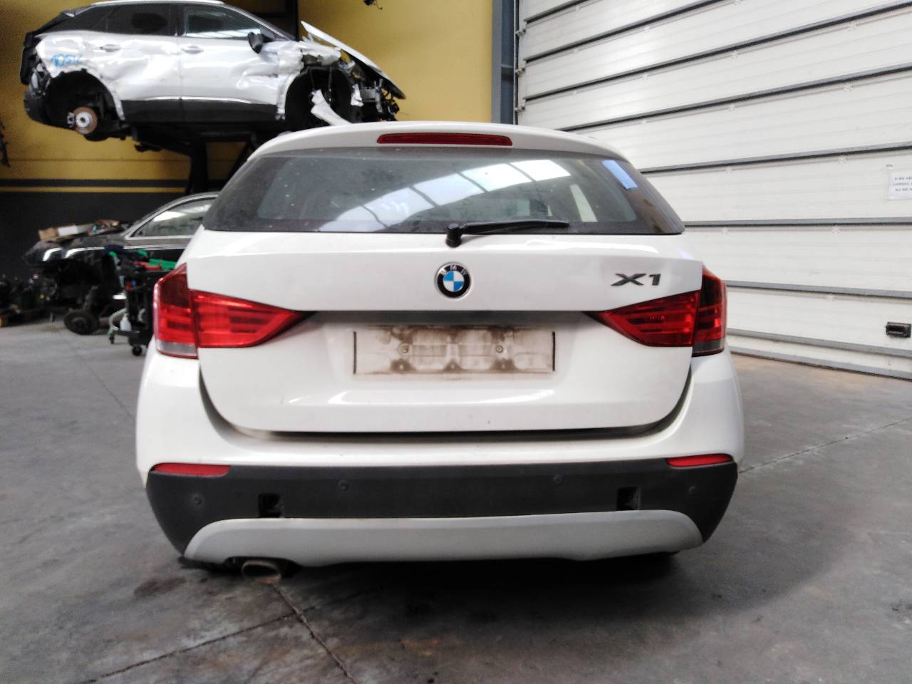BMW X1 E84 (2009-2015) Galinio dangčio (bagažinės) kairės pusės žibintas 6321299247904, 3021210197, E1-A3-47-1 24087566
