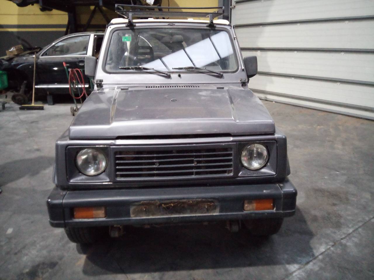 SUZUKI Samurai SJ20 (1981-1998) Регулятор вікна лівої передньої двері 21818977